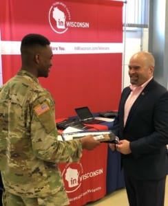 Steve Janke meets with a transitioning service member at a career summit.